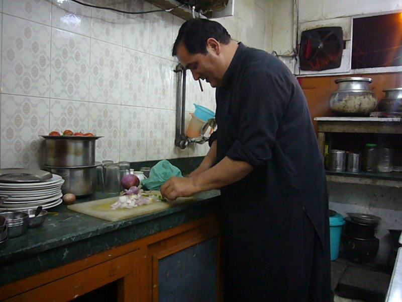 Raj at a kashmiri restaurant in Srinagar. The food was excellent but the man was a complete liar.
