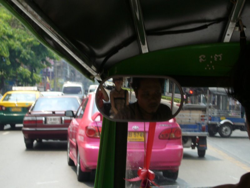 Tuk tuk down Samsen Road.